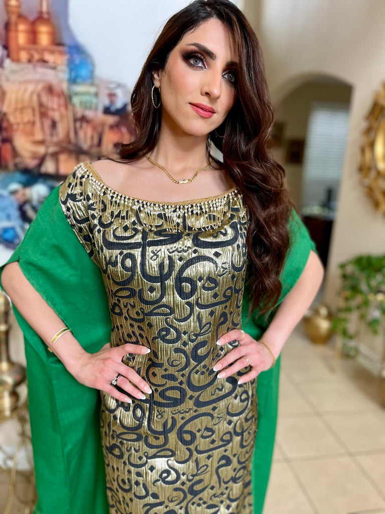 Green Off-Shoulder Crecent Dress with Arabic Letters.