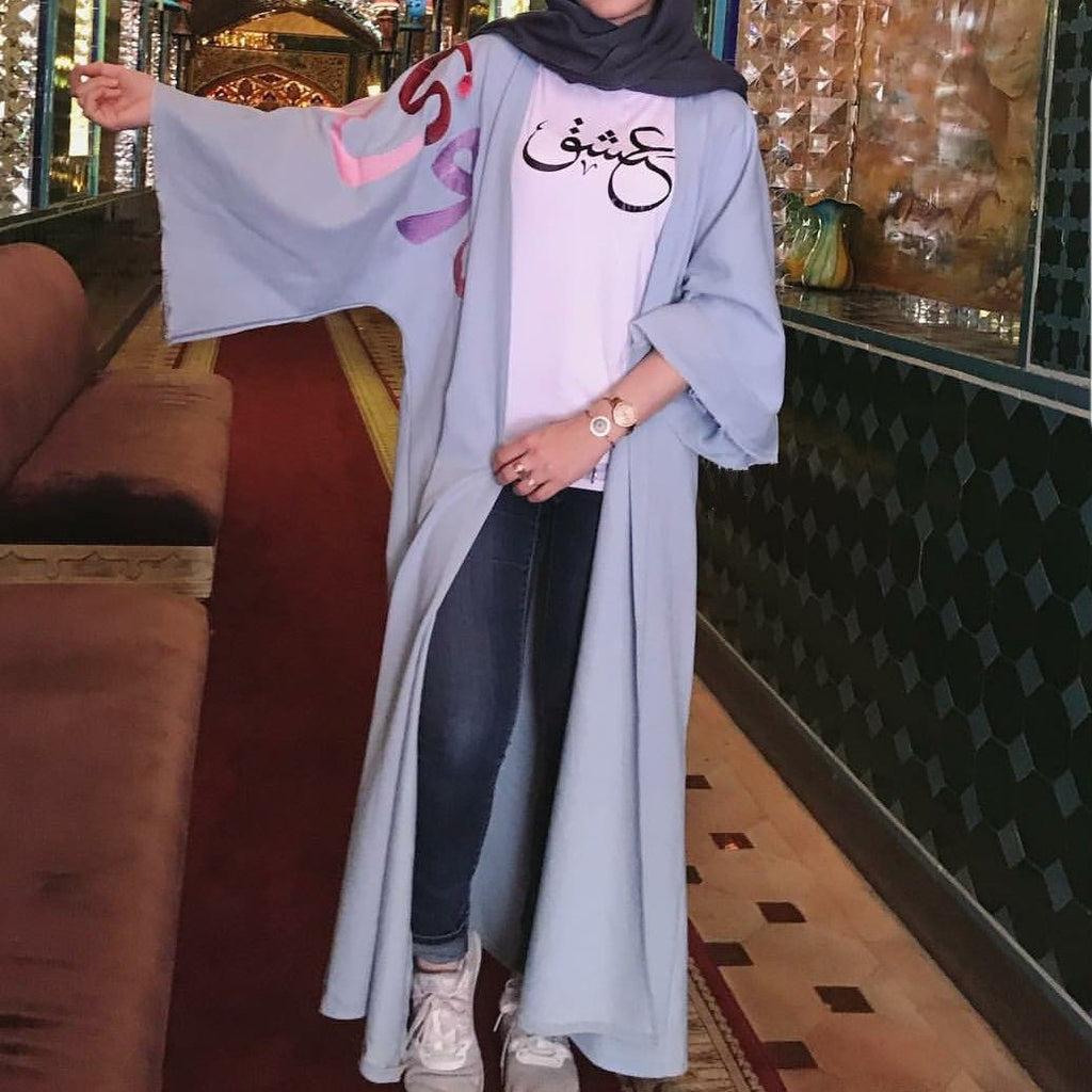 Person wearing the blue denim abaya. 